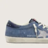 Women’s Super-Star in denim-blue suede with silver glitter star