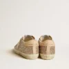 Women’s Super-Star in silver glitter with leather star and heel tab