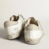 Women's Super-Star in white leather with perforated star and beige nubuck heel tab