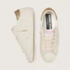 Women’s Super-Star in worn white leather with tone-on-tone star