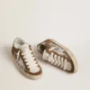 Women's Super-Star in zebra-print pony skin with leather star and brown suede inserts