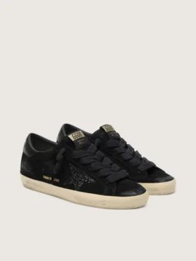 Women’s Super-Star LTD in black suede with black glitter star and black leather heel tab