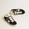Women's Super-Star LTD in black suede with white printed star and silver glitter heel tab