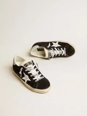 Women’s Super-Star LTD in black suede with white printed star and silver glitter heel tab
