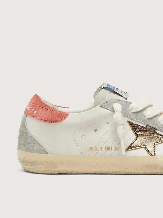 Women's Super-Star LTD in white leather with metallic bronze star