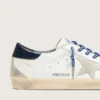 Women’s Super-Star LTD in white leather with suede star and blue leather heel tab