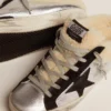 Women's Super-Star Sabot in silver laminated leather with black star