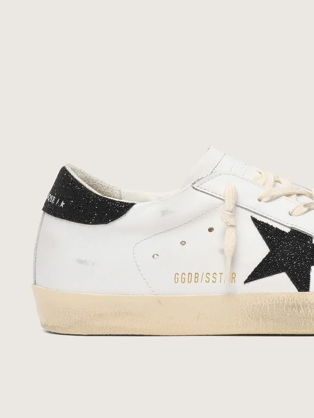 Women’s Super-Star with a black Swarovski crystal star and heel tab