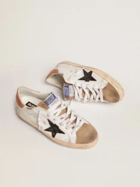 Women’s Super-Star with black glitter star and pink heel tab
