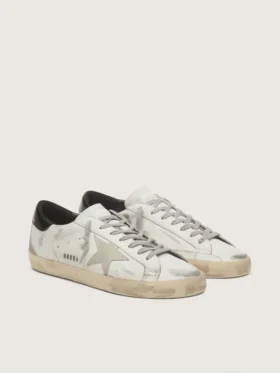 Women’s Super-Star with black heel tab and metal stud lettering