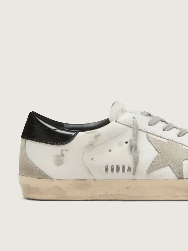 Men's Super-Star with black heel tab and metal stud lettering