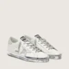 Women's Super-Star with silver sparkle foxing and metal stud lettering