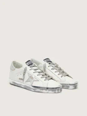 Women’s Super-Star with silver sparkle foxing and metal stud lettering