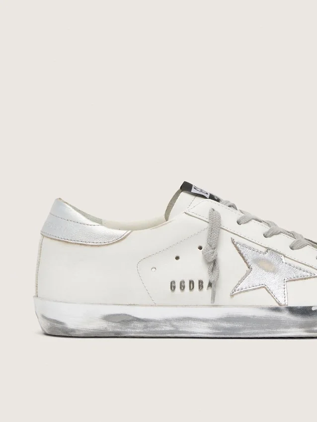 Women's Super-Star with silver sparkle foxing and metal stud lettering