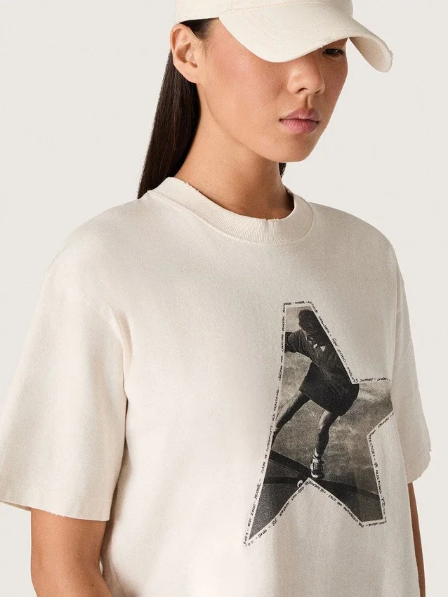 Women’s T-shirt in white cotton jersey with star print