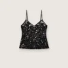 Women's top in black tulle with floral pattern in black sequins
