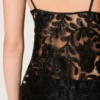 Women's top in black tulle with floral pattern in black sequins