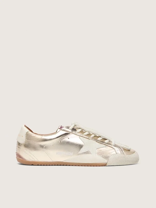 Men’s True-Star in metallic platinum leather with light gray suede star