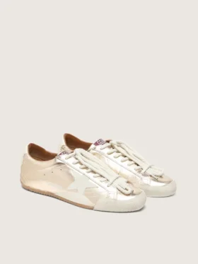 Women’s True-Star in metallic platinum leather with light gray suede star