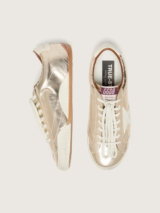 Men’s True-Star in metallic platinum leather with light gray suede star