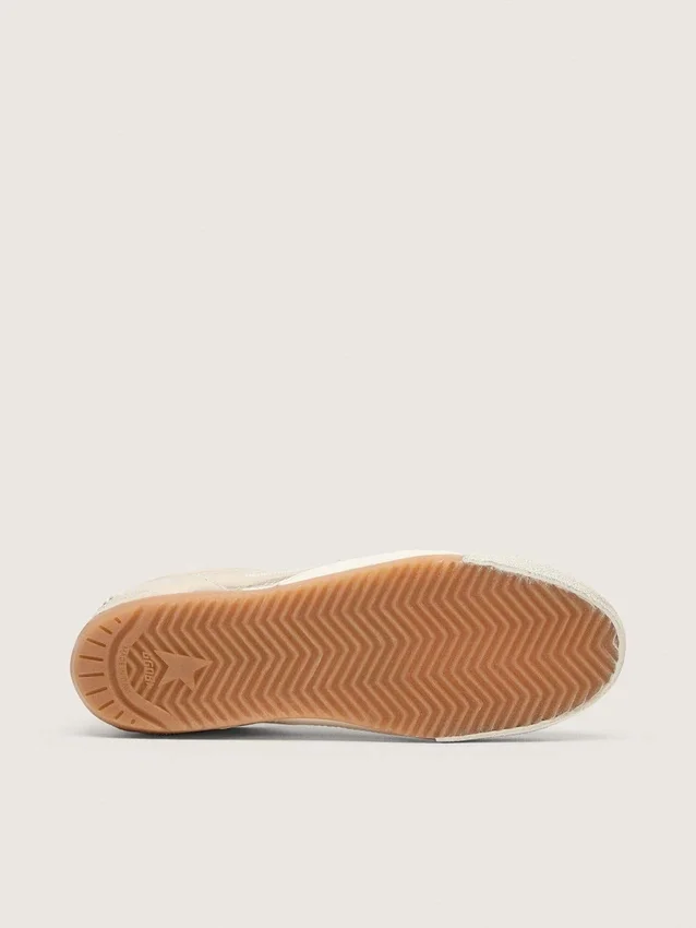 Men’s True-Star in metallic platinum leather with light gray suede star