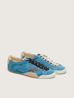 Women’s True-Star in teal suede with black star and cream heel tab