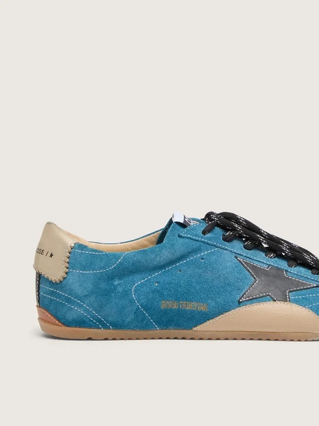 Women's True-Star in teal suede with black star and cream heel tab