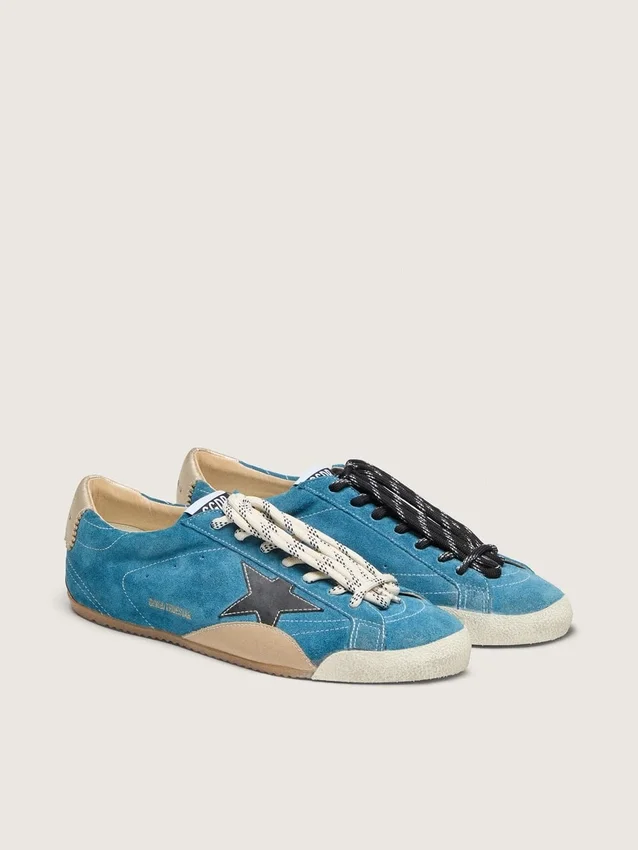 Women's True-Star in teal suede with black star and cream heel tab