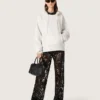 Women's tulle pants with floral embroidery in black sequins