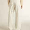Women's white denim pants with beading and crystals