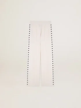 Women’s white joggers with stars on the sides
