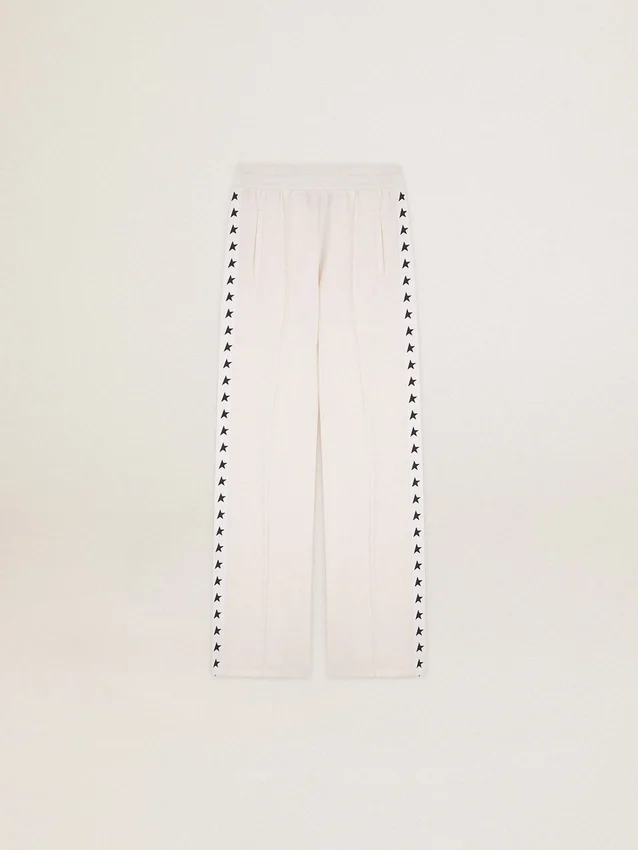 Women’s white joggers with stars on the sides