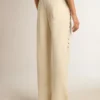 Women’s white joggers with stars on the sides