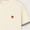 Women’s white knit T-shirt with contrasting edges and removable pin