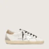 Women's white leather Super-Star with glittery heel tab