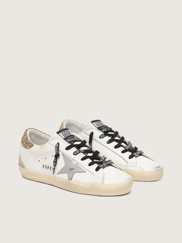 Women's white leather Super-Star with glittery heel tab
