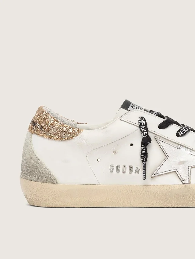 Women's white leather Super-Star with glittery heel tab