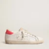 Women's white leather Super-Star with perforated star and fuchsia nylon heel tab