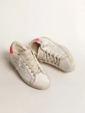 Women’s white leather Super-Star with perforated star and fuchsia nylon heel tab