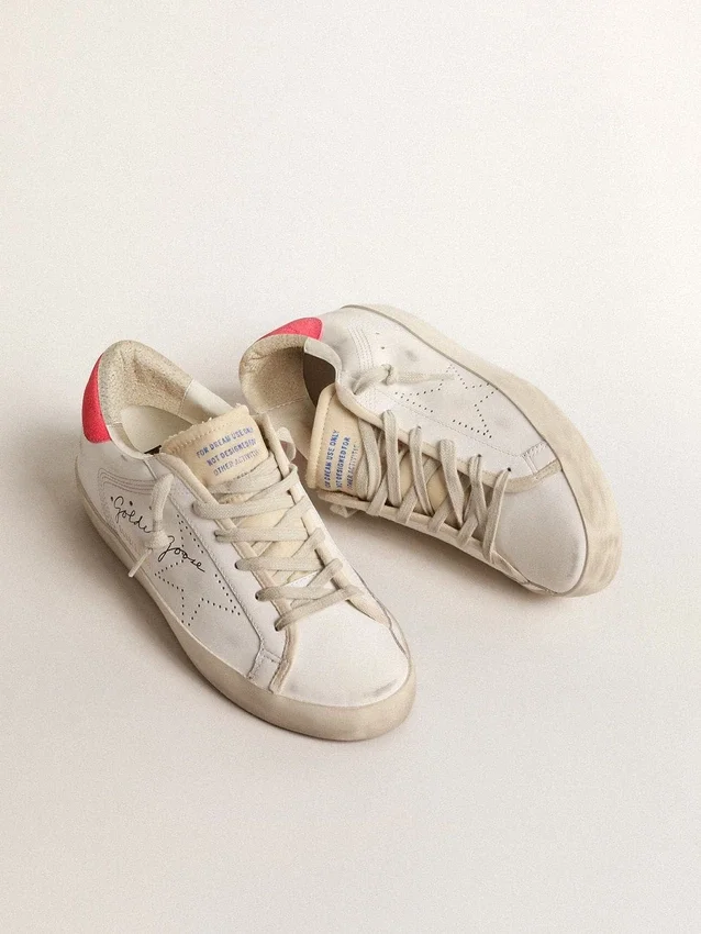 Women's white leather Super-Star with perforated star and fuchsia nylon heel tab