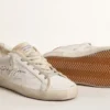 Women's white leather Super-Star with perforated star and fuchsia nylon heel tab