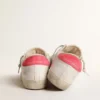 Women's white leather Super-Star with perforated star and fuchsia nylon heel tab