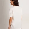 Women's white T-shirt with cabochon crystals