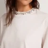 Women's white T-shirt with cabochon crystals