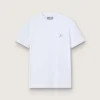 Women's white T-shirt with silver glitter star on the front