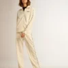 Women’s white zipped sweatshirt with white strip and black stars