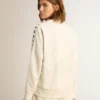 Women’s white zipped sweatshirt with white strip and black stars