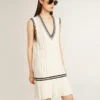 Women's worn-white cotton vest dress with dark blue ribbing and crystals