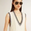 Women's worn-white cotton vest dress with dark blue ribbing and crystals
