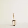 Worn white AirPod case